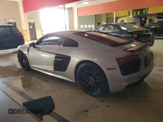 2018 Audi R8 V10 z VIN WUABAAFX7J7902267, wystawiony jako Copart lot #44403794 z przebiegiem Nie podano mil oraz Szkoda całkowita • Salvage title. Historia ofert i sprzedaży dostępna na DreamBid. Obrazek 2.