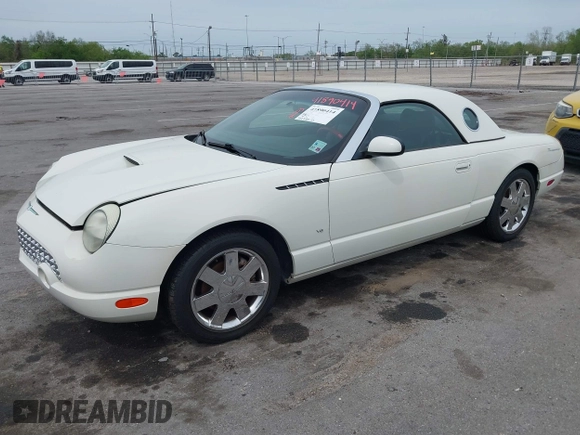 2003 Ford Thunderbird Deluxe z VIN 1FAHP60A03Y113355, wystawiony jako IAAI lot #41890414 z przebiegiem 147 620 mil mil oraz . Historia ofert i sprzedaży dostępna na DreamBid. Obrazek 14.