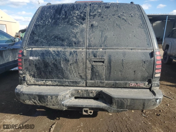 1999 GMC Denali with VIN 1GKEK13R1XR914199, listed as a Copart auction lot 46247985 with 143,628 mi miles and Salvage Title. Bid and sale history available at carsss.com. Image 6.