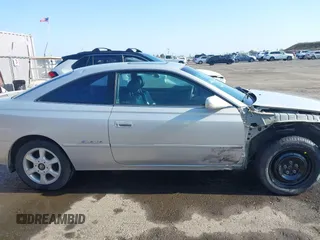 2001 Toyota Solara SE z VIN 2T1CF28P91C491927, wystawiony jako IAAI lot #42475651 z przebiegiem 142 628 mil mil oraz . Historia ofert i sprzedaży dostępna na DreamBid. Obrazek 14.