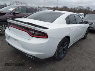 2019 Dodge Charger SXT with VIN 2C3CDXBG9KH598841, listed as a IAAI auction lot 41093938 with 112,359 mi miles. Bid and sale history available at carsss.com. Image 4.