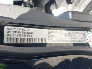 2023 Dodge Durango R/T Plus z VIN 1C4SDHCT7PC553285, wystawiony jako IAAI lot #41875441 z przebiegiem 25 419 mil mil oraz . Historia ofert i sprzedaży dostępna na DreamBid. Obrazek 9.