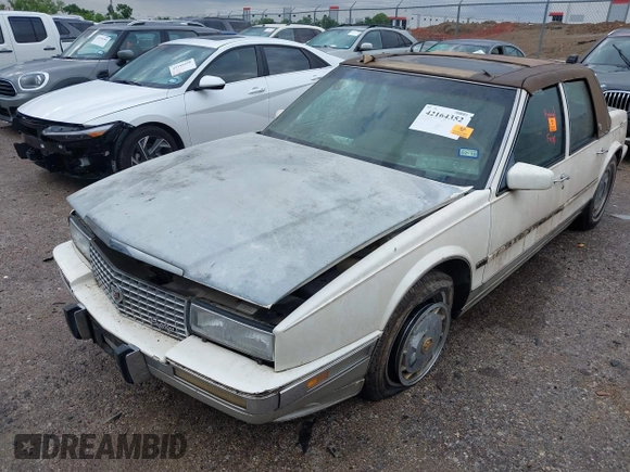 1990 Cadillac Seville z VIN 1G6KY533XLU803161, wystawiony jako IAAI lot #42164352 z przebiegiem Nie podano mil oraz . Historia ofert i sprzedaży dostępna na DreamBid. Obrazek 6.