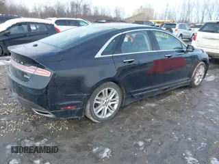 2016 Lincoln MKZ z VIN 3LN6L2JK8GR602793, wystawiony jako IAAI lot #41744058 z przebiegiem 105 234 mil mil oraz . Historia ofert i sprzedaży dostępna na DreamBid. Obrazek 4.