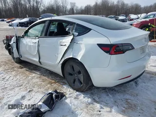 2022 Tesla Model 3 Long Range with VIN 5YJ3E1EB6NF114723, listed as a IAAI auction lot 41396258 with 2,179 mi miles and . Bid and sale history available at DreamBid. Image 3.