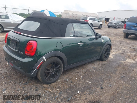 2016 MINI Convertible with VIN WMWWG5C51G3C19231, listed as a IAAI auction lot 42246342 with 93,576 mi miles and . Bid and sale history available at DreamBid. Image 4.