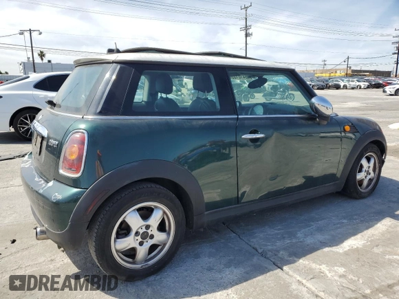 2008 MINI Hardtop with VIN WMWMF33578TT62441, listed as a Copart auction lot 48410155 with 116,894 mi miles and Salvage title. Bid and sale history available at DreamBid. Image 3.
