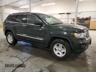 2011 Jeep Grand Cherokee 70th Anniversary with VIN 1J4RR4GT3BC736981, listed as a Copart auction lot 49171525 with 127,438 mi miles and Salvage Title. Bid and sale history available at carsss.com. Image 4.