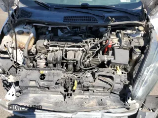 2014 Ford Fiesta S z VIN 3FADP4TJ6EM177381, wystawiony jako Copart lot #55416715 z przebiegiem 125 062 mil mil oraz Szkoda całkowita • Salvage title. Historia ofert i sprzedaży dostępna na DreamBid. Obrazek 11.