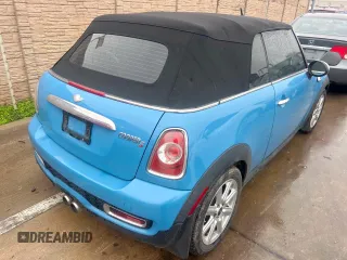 2014 MINI Convertible S z VIN WMWZP3C57ET706977, wystawiony jako Copart lot #45777855 z przebiegiem 77 175 mil mil oraz Czysty tytuł • Clean title. Historia ofert i sprzedaży dostępna na DreamBid. Obrazek 4.
