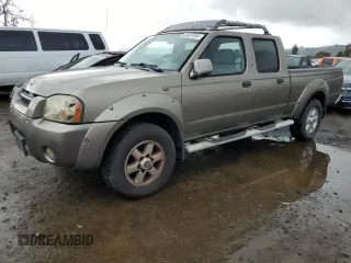2003 Nissan Frontier SE z VIN 1N6ED29X63C452959, wystawiony jako Copart lot #86027844 z przebiegiem 140 561 mil mil oraz Czysty tytuł • Clean title. Historia ofert i sprzedaży dostępna na DreamBid. Obrazek 1.