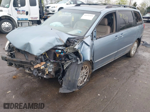 2008 Toyota Sienna XLE with VIN 5TDZK22C48S153784, listed as a IAAI auction lot 41971319 with 126,071 mi miles. Bid and sale history available at carsss.com. Image 18.