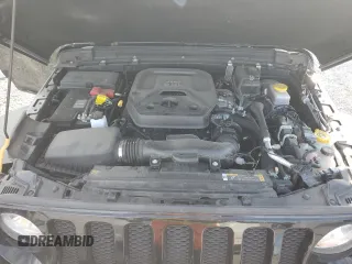 2023 Jeep Wrangler Sport with VIN 1C4HJXDN7PW530536, listed as a Copart auction lot 69664634 with 16,816 mi miles and Salvage Title. Bid and sale history available at DreamBid. Image 12.