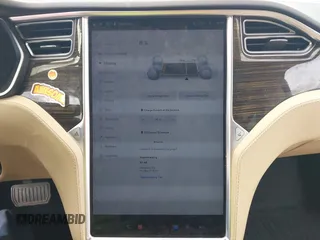 2016 Tesla Model S 90D with VIN 5YJSA1E27GF129130, listed as a IAAI auction lot 41922227 with 134,422 mi miles and . Bid and sale history available at DreamBid. Image 18.