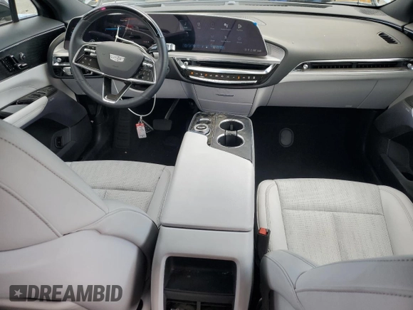 2023 Cadillac LYRIQ RWD Luxury z VIN 1GYKPMRK9PZ001115, wystawiony jako Copart lot #88924135 z przebiegiem 32 114 mil mil oraz Szkoda całkowita • Salvage title. Historia ofert i sprzedaży dostępna na DreamBid. Obrazek 8.