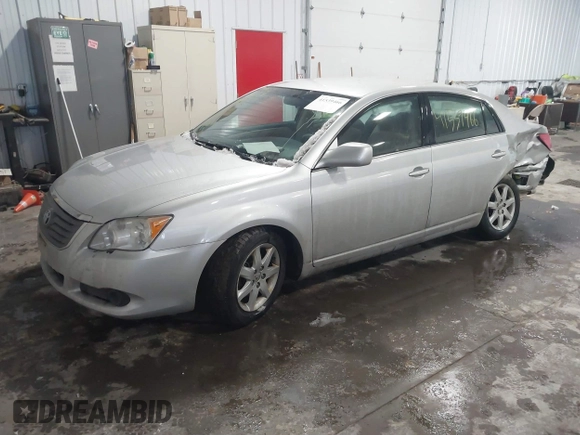 2010 Toyota Avalon XL with VIN 4T1BK3DB1AU362862, listed as a IAAI auction lot 41539466 with 168,762 mi miles and . Bid and sale history available at carsss.com. Image 2.