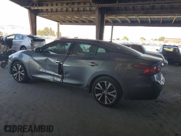 2016 Nissan Maxima Platinum with VIN 1N4AA6AP1GC425497, listed as a Copart auction lot 63340805 with 133,248 mi miles and Salvage title. Bid and sale history available at DreamBid. Image 2.