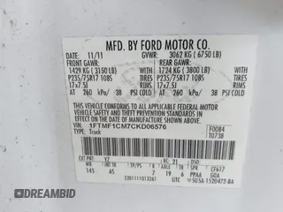 2012 Ford F-150 XL with VIN 1FTMF1CM7CKD06576, listed as a IAAI auction lot 42074226 with 294,349 mi miles. Bid and sale history available at carsss.com. Image 9.