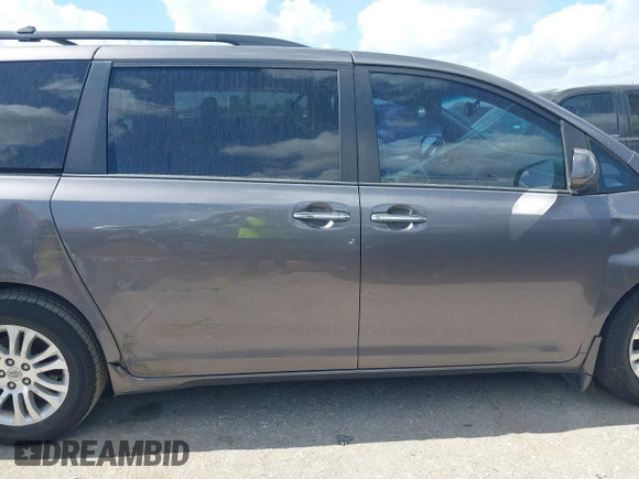 2014 Toyota Sienna XLE with VIN 5TDYK3DC0ES513076, listed as a IAAI auction lot 42724629 with 154,019 mi miles and . Bid and sale history available at DreamBid. Image 13.