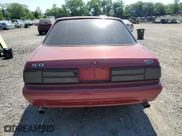 1990 Ford Mustang with VIN 1FACP40E5LF223413, listed as a Copart auction lot 62114315 with Not provided miles and Salvage title. Bid and sale history available at DreamBid. Image 6.