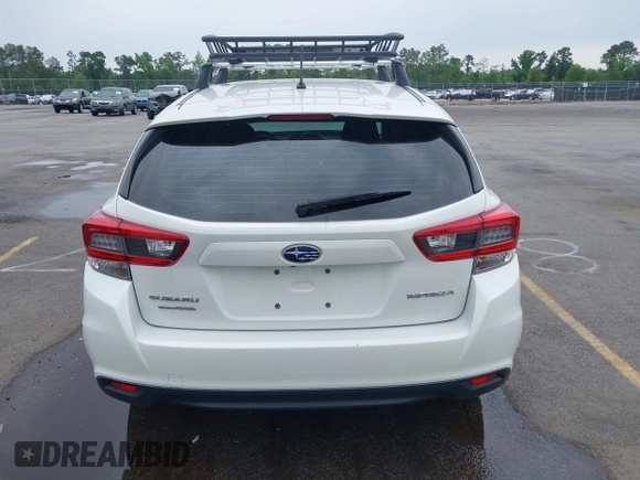 2023 Subaru Impreza with VIN 4S3GTAB6XP3706463, listed as a IAAI auction lot 42201164 with 71,572 mi miles and . Bid and sale history available at DreamBid. Image 16.