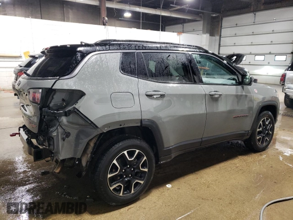 2020 Jeep Compass Trailhawk with VIN 3C4NJDDB0LT215553, listed as a Copart auction lot 45045165 with 90,702 mi miles and Salvage Title. Bid and sale history available at carsss.com. Image 3.