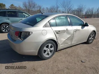2014 Chevrolet Cruze 1LT z VIN 1G1PC5SB5E7469500, wystawiony jako IAAI lot #41804150 z przebiegiem 100 091 mil mil oraz . Historia ofert i sprzedaży dostępna na DreamBid. Obrazek 4.