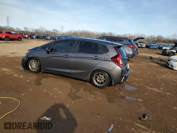2017 Honda Fit LX with VIN 3HGGK5G51HM700577, listed as a Copart auction lot 48713335 with 197,728 mi miles and Salvage Title. Bid and sale history available at DreamBid. Image 2.
