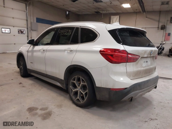 2016 BMW X1 xDrive28i with VIN WBXHT3C30G5E52065, listed as a IAAI auction lot 41552781 with 205,961 mi miles. Bid and sale history available at carsss.com. Image 3.