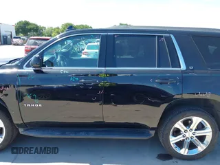 2017 Chevrolet Tahoe LT with VIN 1GNSCBKC3HR373650, listed as a IAAI auction lot 42210651 with 131,091 mi miles and . Bid and sale history available at DreamBid. Image 14.