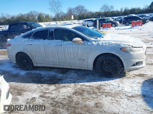 2013 Ford Fusion SE Hybrid with VIN 3FA6P0LU8DR272165, listed as a IAAI auction lot 41333539 with 196,843 mi miles. Bid and sale history available at carsss.com. Image 12.