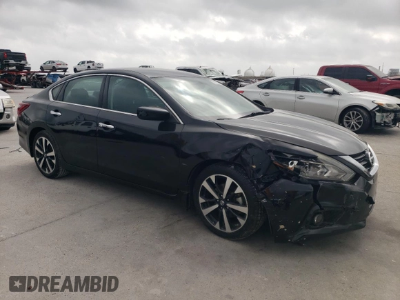 2018 Nissan Altima SR with VIN 1N4AL3AP8JC120286, listed as a Copart auction lot 51776865 with 87,942 mi miles and Salvage Title. Bid and sale history available at DreamBid. Image 4.