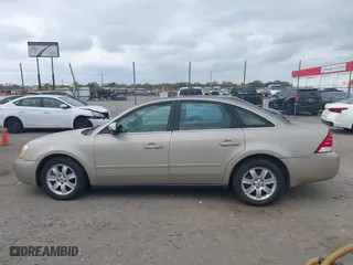 2005 Mercury Montego with VIN 1MEHM40195G606109, listed as a IAAI auction lot 40739316 with 329,715 mi miles. Bid and sale history available at carsss.com. Image 14.