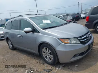 2016 Honda Odyssey EX-L z VIN 5FNRL5H61GB075046, wystawiony jako IAAI lot #42427786 z przebiegiem 74 423 mil mil oraz . Historia ofert i sprzedaży dostępna na DreamBid. Obrazek 1.