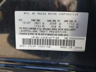 2008 Mazda 3 i Touring with VIN JM1BK12G081877189, listed as a IAAI auction lot 42147537 with 166,780 mi miles and . Bid and sale history available at carsss.com. Image 9.