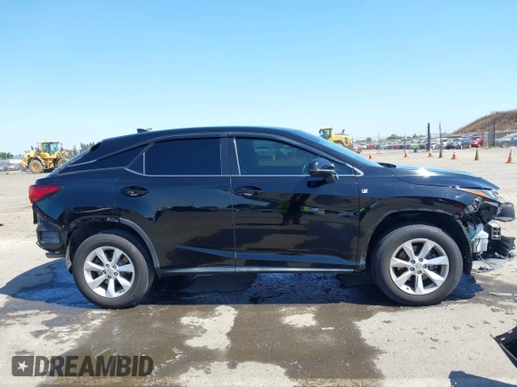 2016 Lexus RX 350 z VIN 2T2BZMCA6GC002373, wystawiony jako IAAI lot #42356683 z przebiegiem 107 067 mil mil oraz . Historia ofert i sprzedaży dostępna na DreamBid. Obrazek 14.