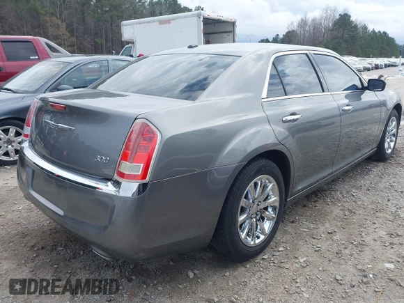 2012 Chrysler 300 Limited with VIN 2C3CCACG4CH308408, listed as a IAAI auction lot 41734589 with 135,813 mi miles. Bid and sale history available at carsss.com. Image 4.