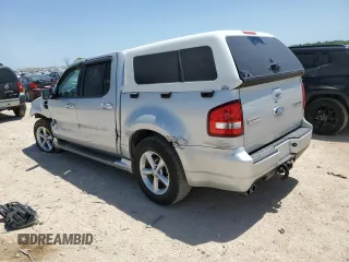 2009 Ford Explorer Sport Trac with VIN 1FMEU23809UA12870, listed as a Copart auction lot 52614055 with 313,938 mi miles and Salvage title. Bid and sale history available at DreamBid. Image 2.