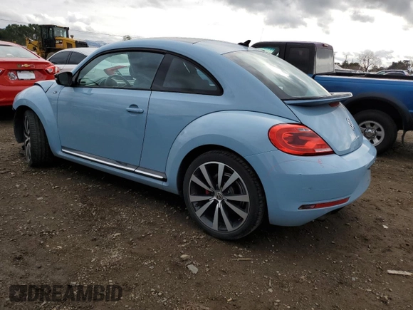 2014 Volkswagen Beetle Turbo R-Line with VIN 3VWVT7AT5EM635862, listed as a Copart auction lot 43500865 with 58,412 mi miles and Salvage Title. Bid and sale history available at DreamBid. Image 2.