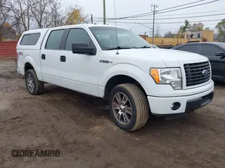 2014 Ford F-150 XL with VIN 1FTFW1EFXEFB08741, listed as a IAAI auction lot 40930645 with 138,394 mi miles and . Bid and sale history available at DreamBid. Image 1.