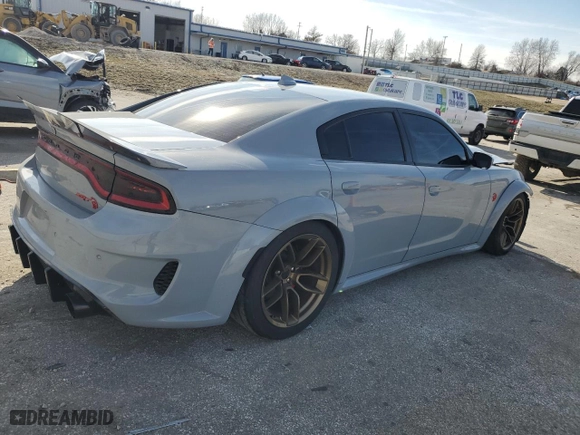 2021 Dodge Charger SRT Hellcat Redeye Widebody with VIN 2C3CDXL91MH630216, listed as a Copart auction lot 43798575 with 24,707 mi miles and Salvage Title. Bid and sale history available at carsss.com. Image 3.
