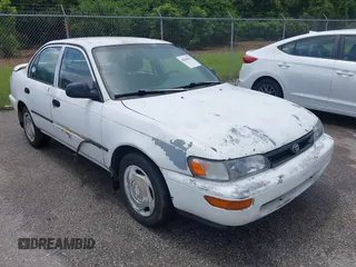 1993 Toyota Corolla with VIN 1NXAE04E9PZ113388, listed as a IAAI auction lot 42556633 with 130,024 mi miles and . Bid and sale history available at DreamBid. Image 1.