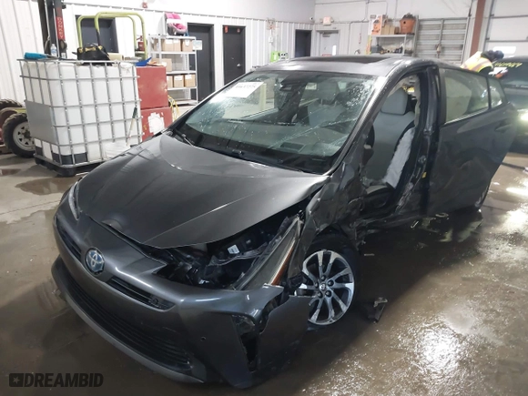 2021 Toyota Prius L Eco with VIN JTDKAMFU9M3132587, listed as a IAAI auction lot 41637275 with 84,203 mi miles. Bid and sale history available at carsss.com. Image 2.