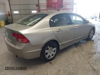 2006 Honda Civic LX z VIN 1HGFA16556L005459, wystawiony jako IAAI lot #41940768 z przebiegiem 178 595 mil mil oraz . Historia ofert i sprzedaży dostępna na DreamBid. Obrazek 4.
