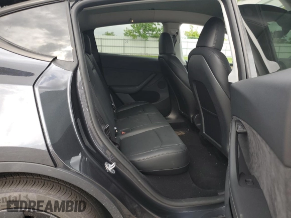 2024 Tesla Model Y с VIN 7SAYGDED4RA329638, выставлен на аукционе Copart как лот 54562525 с пробегом 8 606 миль миль и Списание • Salvage title. История ставок и продаж доступна на DreamBid. Изображение 10.