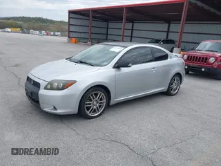 2009 Scion tC with VIN JTKDE167190282930, listed as a IAAI auction lot 42034538 with 198,964 mi miles. Bid and sale history available at carsss.com. Image 2.