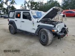 2023 Jeep Wrangler Sport с VIN 1C4HJXDGXPW596127, выставлен на аукционе Copart как лот 56645205 с пробегом 64 257 миль миль и Списание • Salvage title. История ставок и продаж доступна на DreamBid. Изображение 4.
