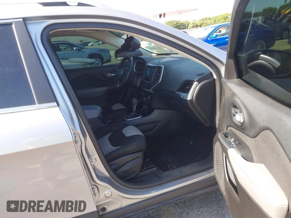 2014 Jeep Cherokee Latitude with VIN 1C4PJLCS6EW103423, listed as a IAAI auction lot 40118289 with 112,120 mi miles and . Bid and sale history available at DreamBid. Image 5.
