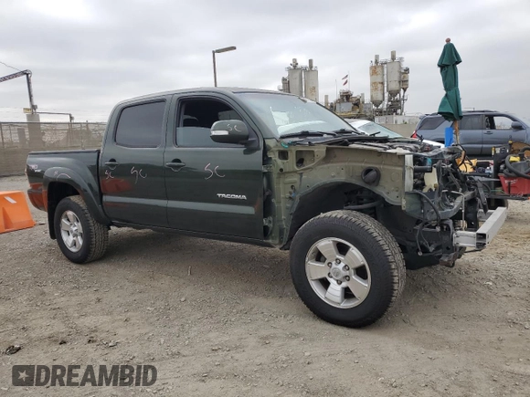 2013 Toyota Tacoma PreRunner with VIN 3TMJU4GN9DM141945, listed as a Copart auction lot 64747625 with 130,793 mi miles and Salvage title. Bid and sale history available at DreamBid. Image 4.