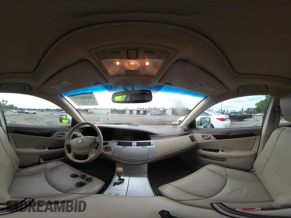 2010 Toyota Avalon XL with VIN 4T1BK3DB8AU354533, listed as a IAAI auction lot 41802797 with 117,956 mi miles and . Bid and sale history available at carsss.com. Image 20.